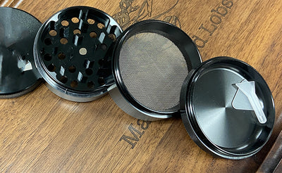 LED Light Show Herb Grinder ~ Magnetic Lid, 4 Pieces with Screen Catcher, Let our fun 2.5" Black Retro-Grind light up your daily grind! - Headshop.com